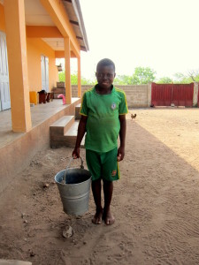 Jacob holding pail